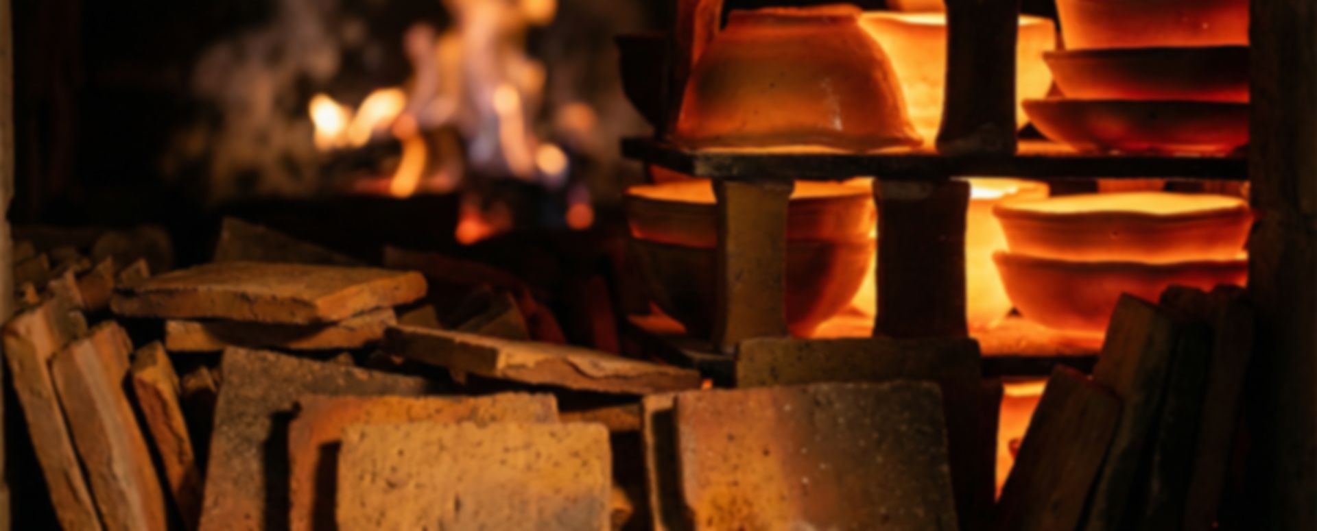 Ceramic tiles inside a kiln with glowing fire